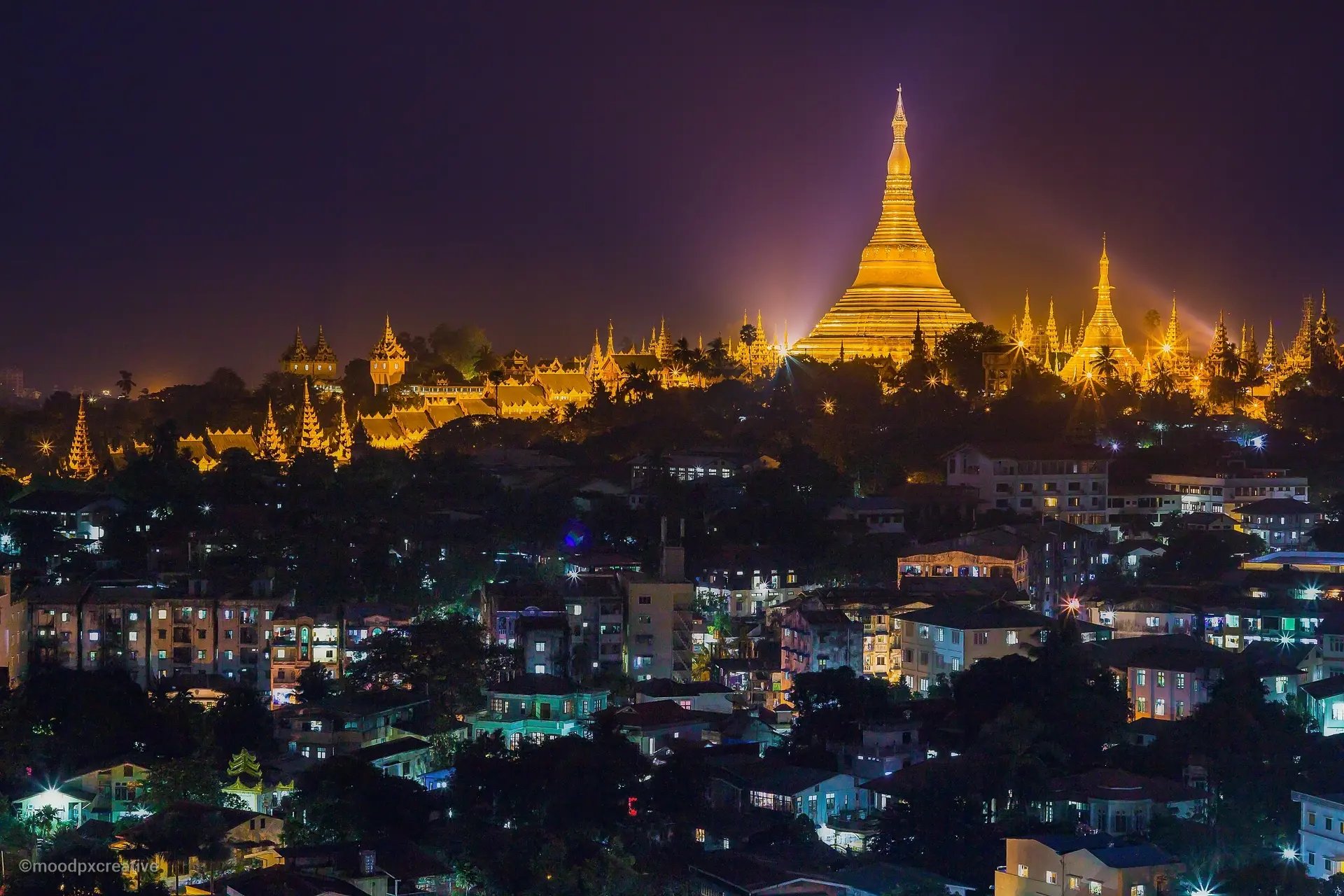 Shwedagon Pagoda Overlooking the Breathtaking Cityscape.