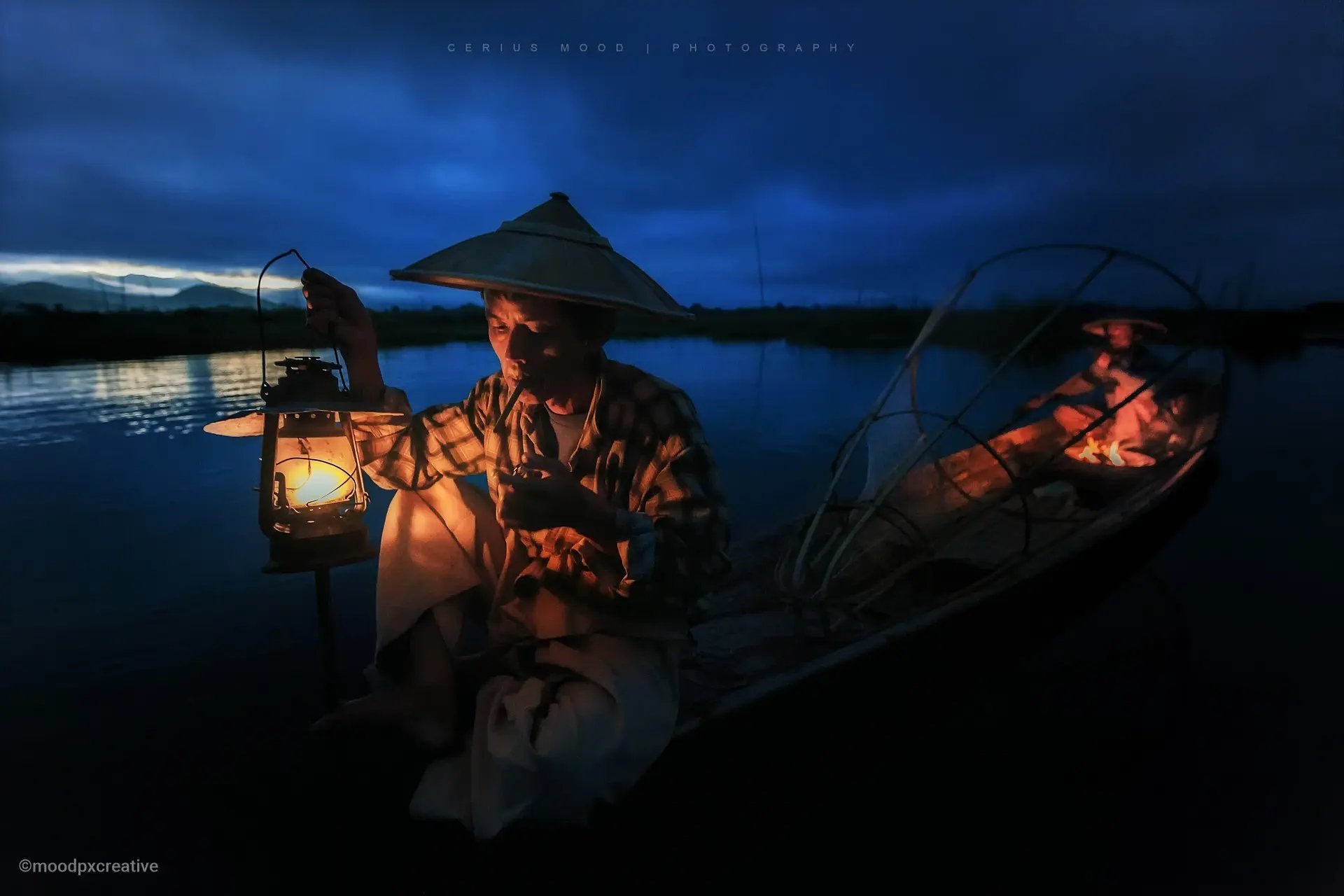 Two fishermen from Inle Lake begin their day before sunrise.